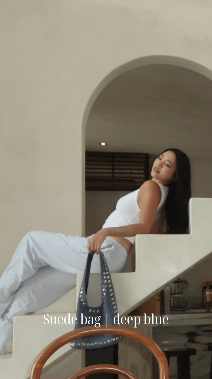 Blue medium size suede bag