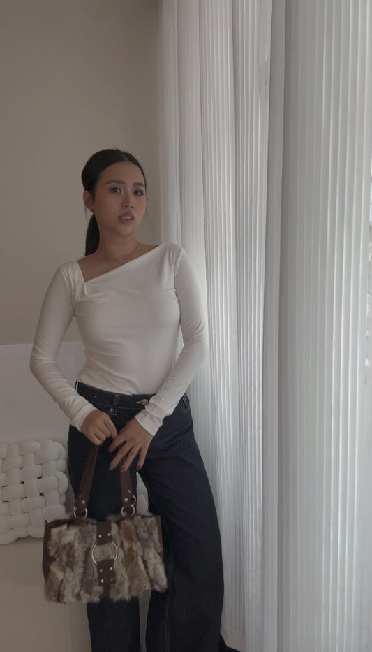 Asymmetrical long sleeve